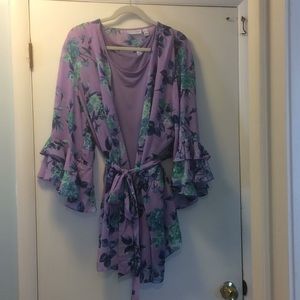 Two piece tank with chiffon tie overlay.